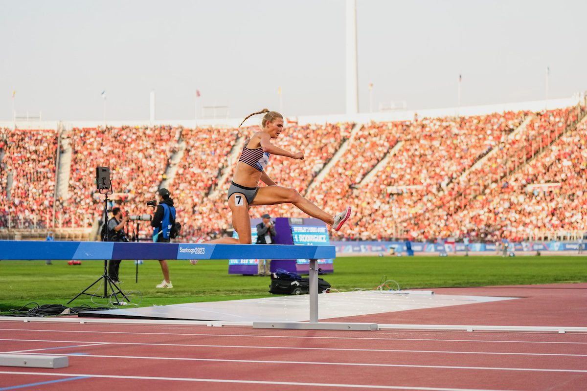 Kiana Gibson racing the steeplechase